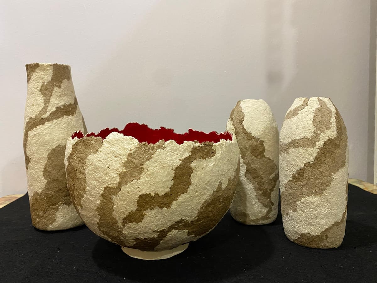 a photo of paper mache bowl and vases